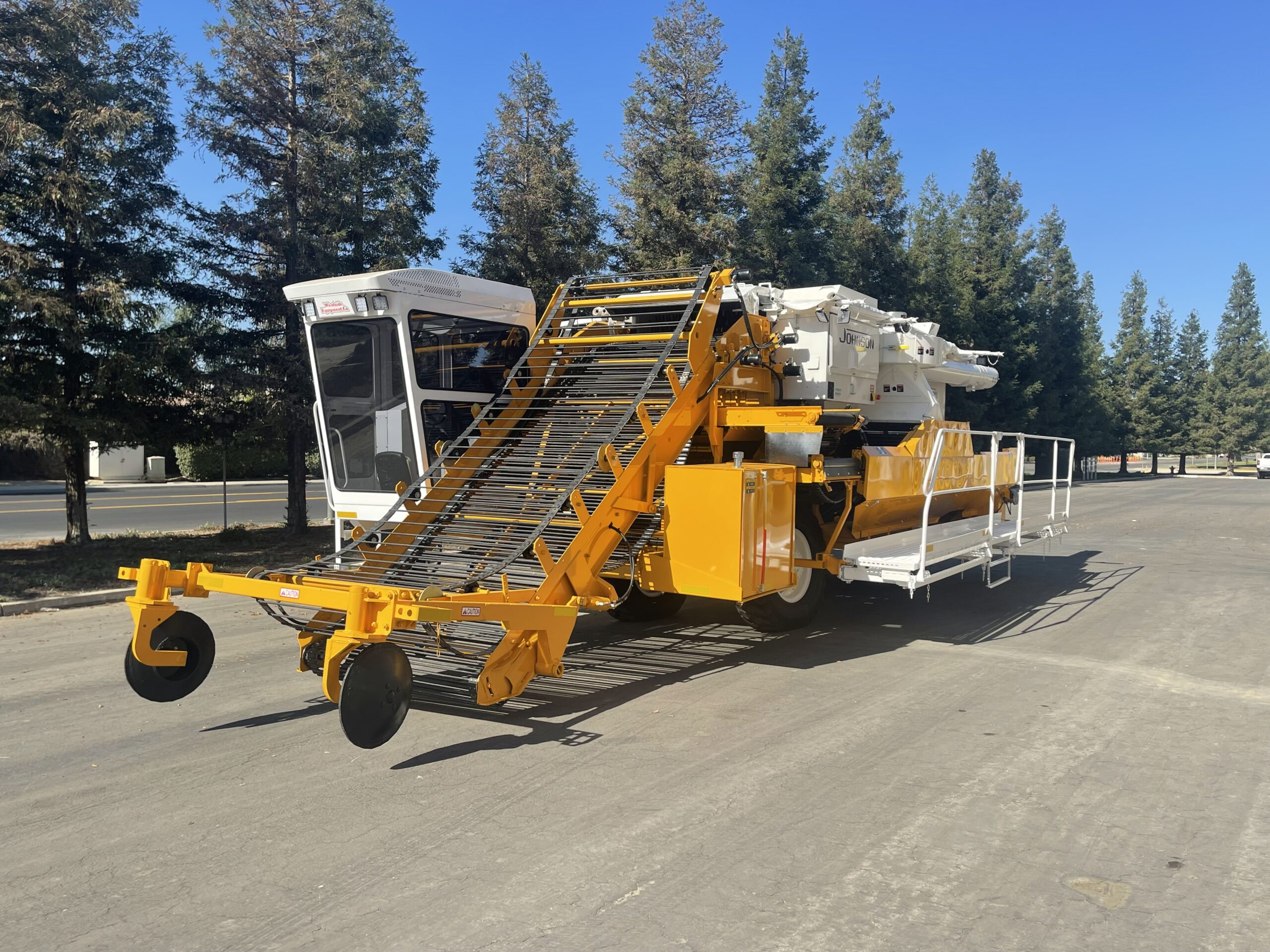 Johnson Tomato Harvester with closed cab